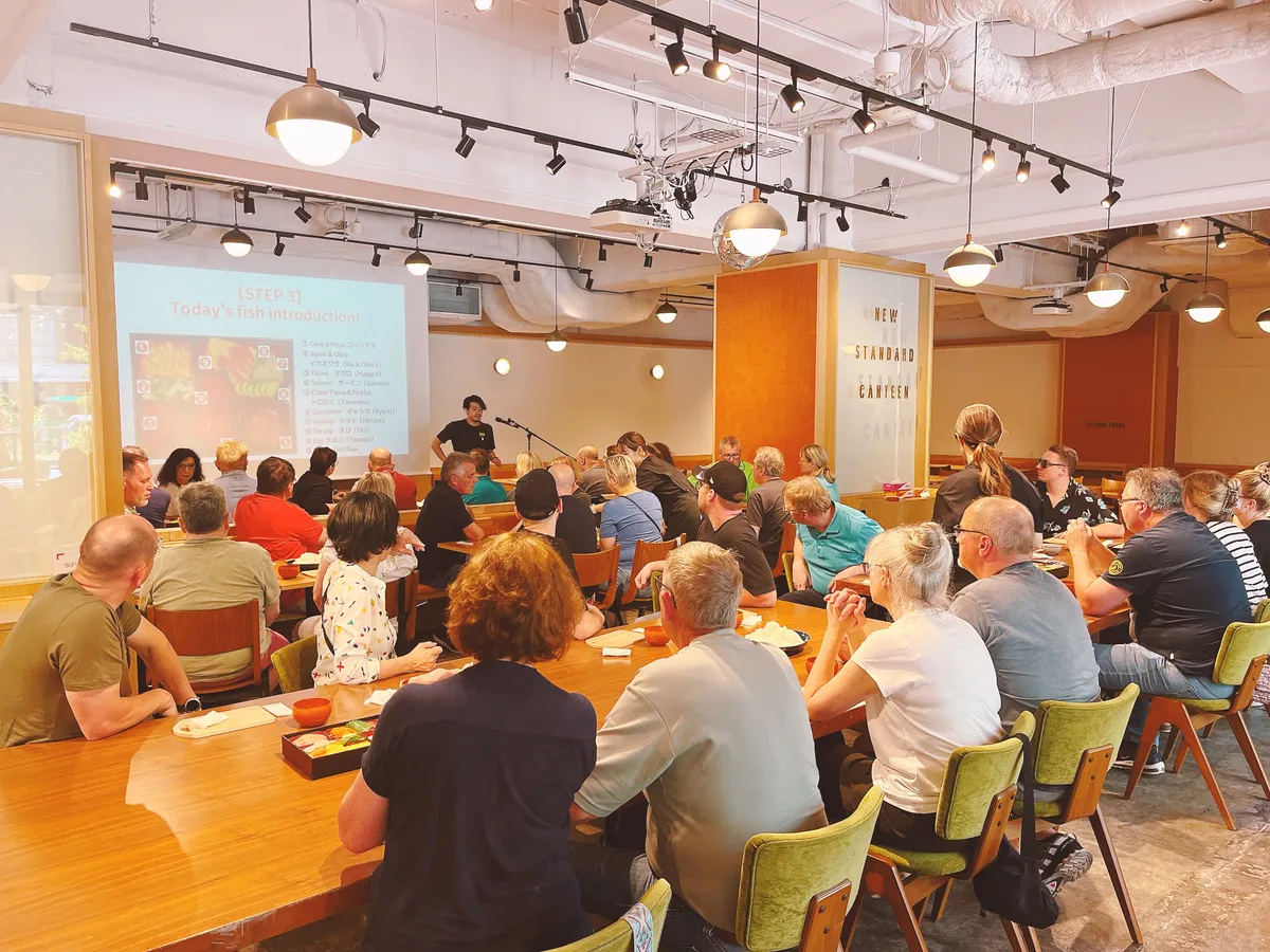 Large group sushi making workshop at an offsite venue